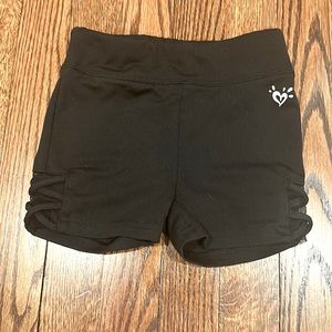 Justice black tight shorts size 6-7